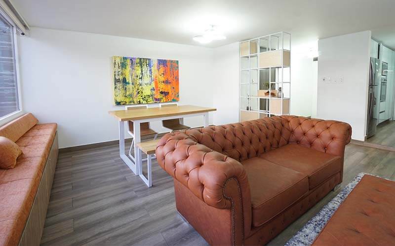 leather couch and dining area